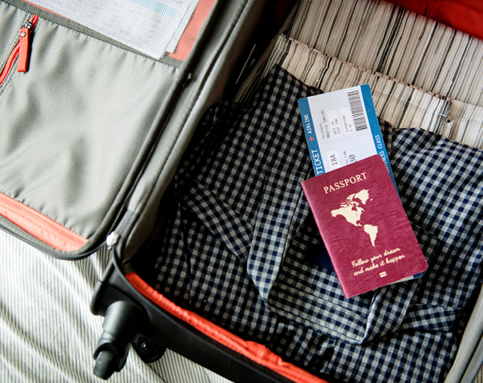 image of a passport with a suitcase